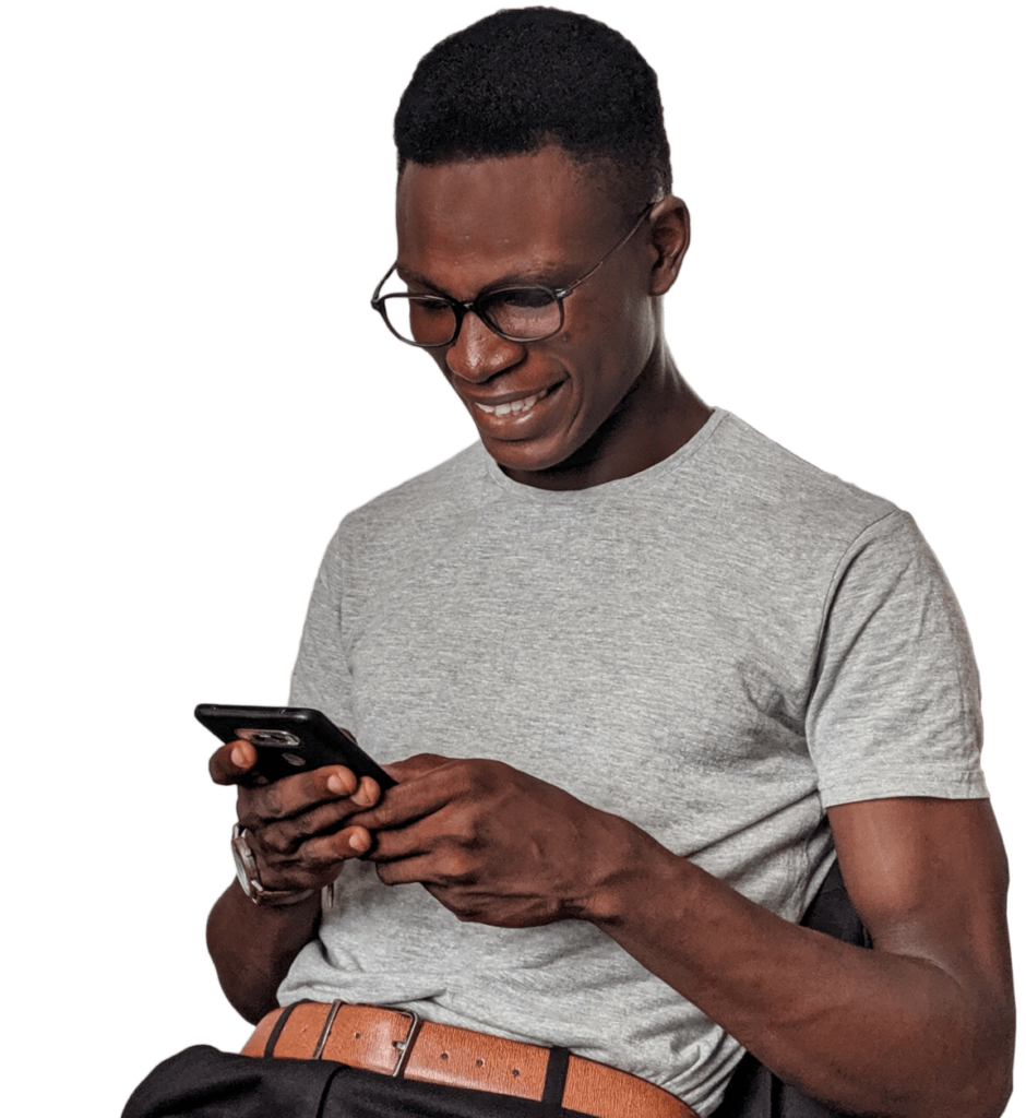 Man looking at his phone happy that he's getting support responses.