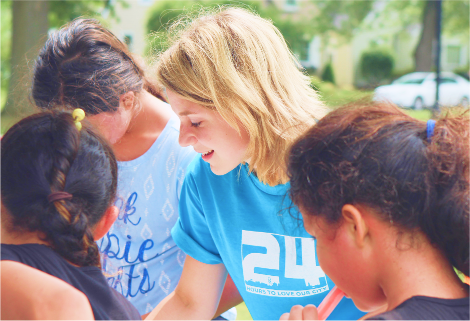 A volunteer at a Giving Tuesday fundraising event.